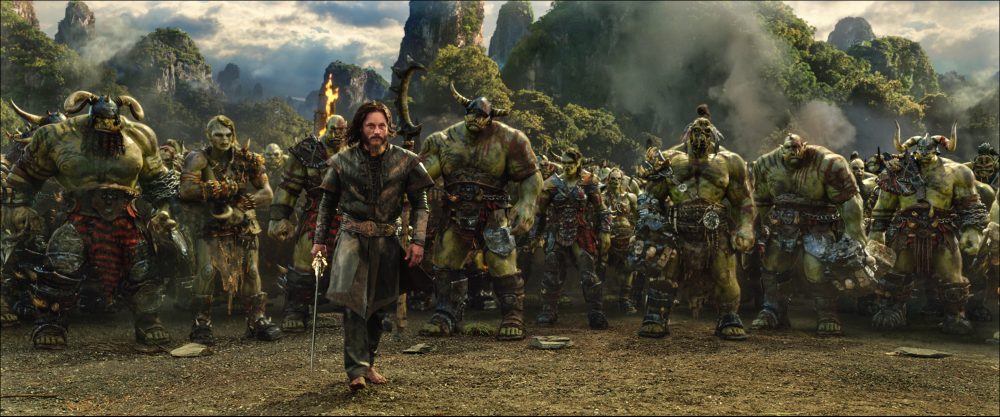 Surrounded by orcs, Commander Anduin Lothar (TRAVIS FIMMEL) knows that the battle is far from over in Warcraft. From Legendary Pictures and Universal Pictures comes Warcraft, an epic adventure of world-colliding conflict based on Blizzard Entertainment’s global phenomenon. Credit: Legendary Pictures, Universal Pictures and ILM